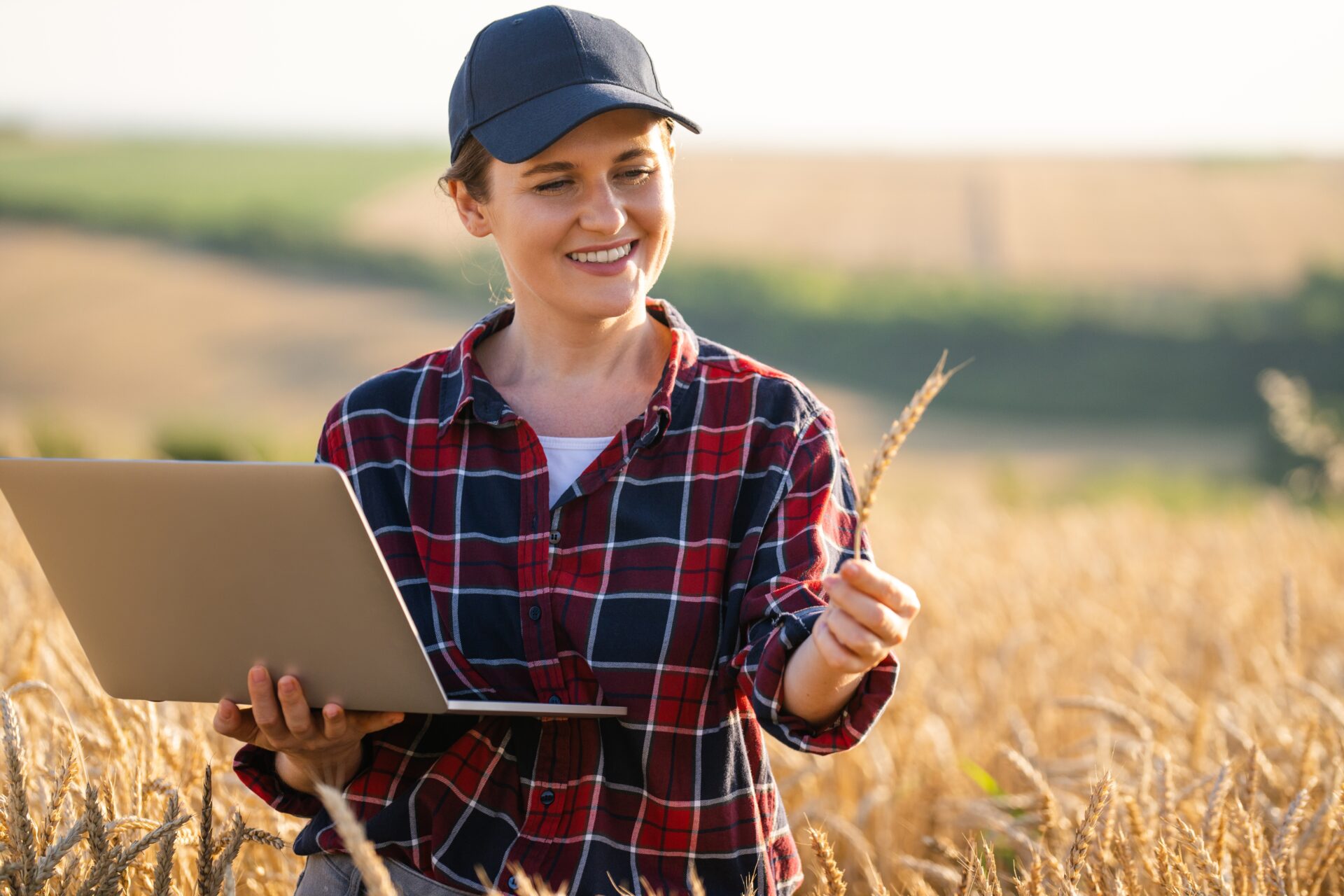 Woman Farmer Working With Laptop On Wheat Field Smart Farming